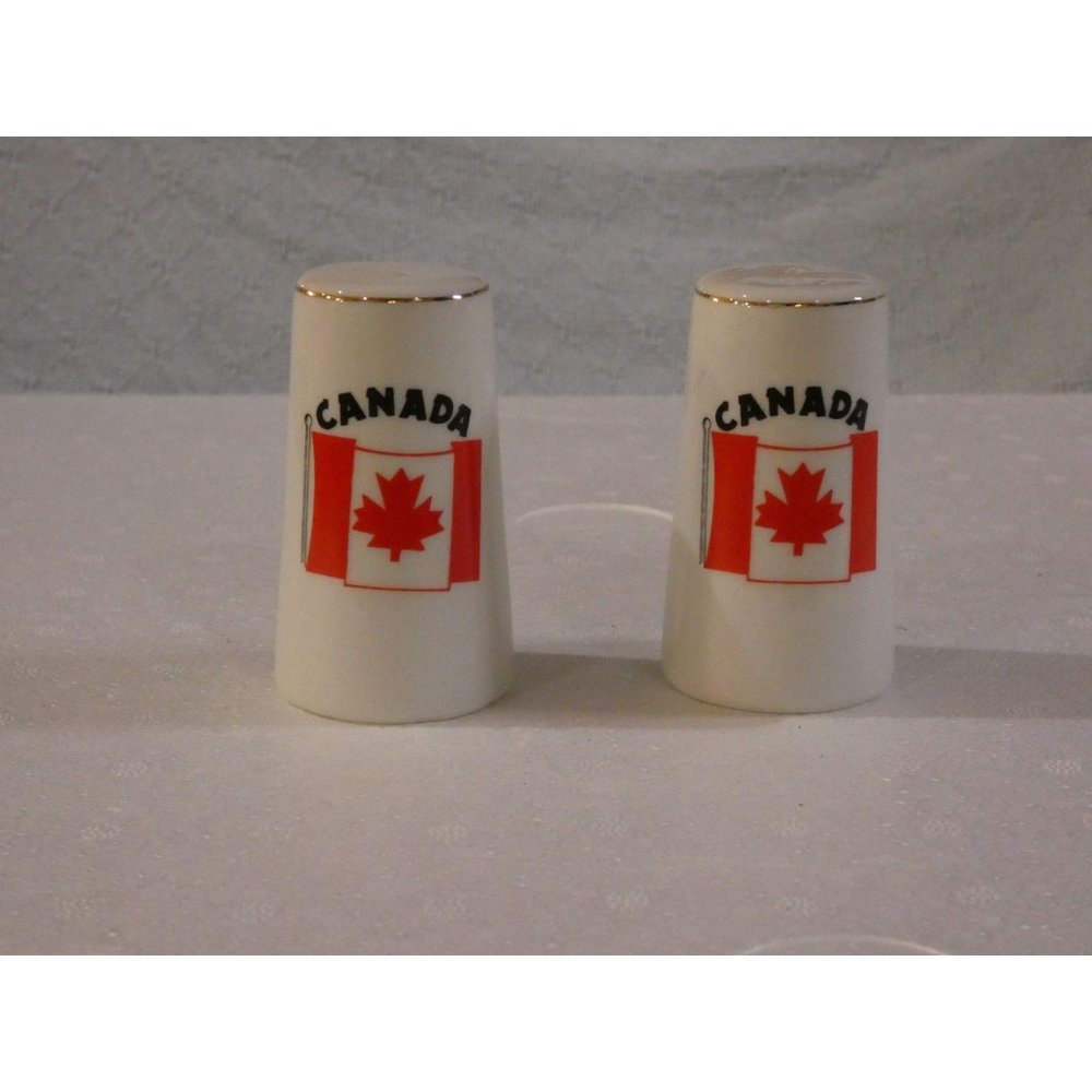 Canada salt and Pepper shakers with Canadian Flag and Gold Trim